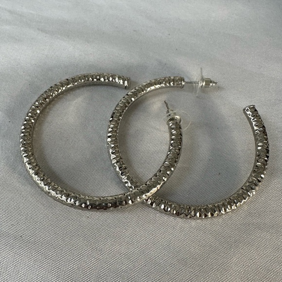 Three silvertone hoops and ear hugger - Picture 3 of 5